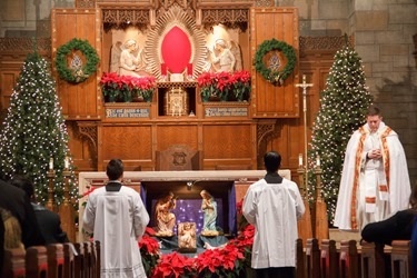 New Year's Eve Holy Hour and Mass celebrated by Cardinal Sean O'Malley at St. Clement's Eucharistic Shrine in Boston Dec. 31, 2015. Pilot photo/ Mark Labbe