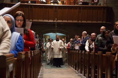 New Year's Eve Holy Hour and Mass celebrated by Cardinal Sean O'Malley at St. Clement's Eucharistic Shrine in Boston Dec. 31, 2015. Pilot photo/ Mark Labbe