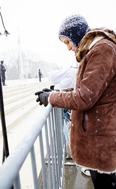 A young woman bows her head at the railing front of the U.S. Supreme Court during the March for Life Jan. 22, 2016. Pilot photo/ Gregory L. Tracy 