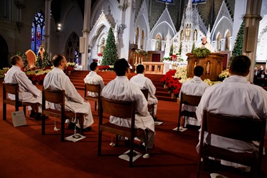 Ordination of Transitional Deacons Chris Bae, Matthew Conley, Patrick Fiorillo, Thomas Gignac, Stephen LeBlanc, Huan Ngo and Thomas Sullivan at the Cathedral of the Holy Cross Jan. 9, 2015. Pilot photo/ Gregory L. Tracy