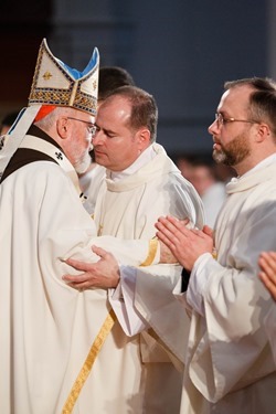 Ordination of Transitional Deacons Chris Bae, Matthew Conley, Patrick Fiorillo, Thomas Gignac, Stephen LeBlanc, Huan Ngo and Thomas Sullivan at the Cathedral of the Holy Cross Jan. 9, 2015. Pilot photo/ Gregory L. Tracy