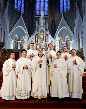 Ordination of Transitional Deacons Chris Bae, Matthew Conley, Patrick Fiorillo, Thomas Gignac, Stephen LeBlanc, Huan Ngo and Thomas Sullivan at the Cathedral of the Holy Cross Jan. 9, 2015. Pilot photo/ Gregory L. Tracy