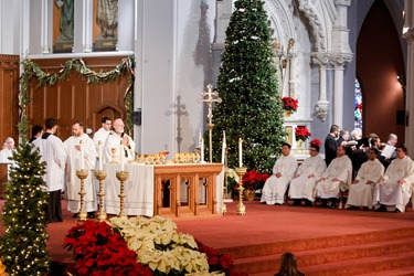 Ordination of Transitional Deacons Chris Bae, Matthew Conley, Patrick Fiorillo, Thomas Gignac, Stephen LeBlanc, Huan Ngo and Thomas Sullivan at the Cathedral of the Holy Cross Jan. 9, 2015. Pilot photo/ Gregory L. Tracy