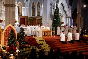 Ordination of Transitional Deacons Chris Bae, Matthew Conley, Patrick Fiorillo, Thomas Gignac, Stephen LeBlanc, Huan Ngo and Thomas Sullivan at the Cathedral of the Holy Cross Jan. 9, 2015. Pilot photo/ Gregory L. Tracy