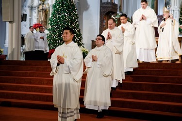 Ordination of Transitional Deacons Chris Bae, Matthew Conley, Patrick Fiorillo, Thomas Gignac, Stephen LeBlanc, Huan Ngo and Thomas Sullivan at the Cathedral of the Holy Cross Jan. 9, 2015. Pilot photo/ Gregory L. Tracy