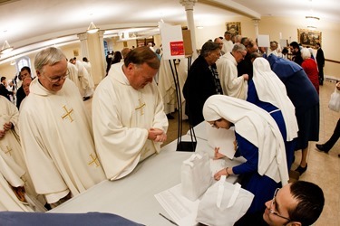 Chrism Mass March 22, 2016 at the Cathedral of the Holy Cross in Boston. Pilot photo/ Gregory L. Tracy