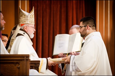 Transitional diaconate ordination of Deacons Jason Giombetti, Pablo Gomis Gonzalez, Godfrey Musabe, Wellington DeOliveira, Joel Santos and William Sexton at the Cathedral of the Holy Cross, April 30, 2016. The men will be ordained to the priesthood in 2017. Pilot photo/ Gregory L. Tracy 