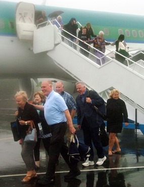 In spite of the atrocious weather, smiles abounded from passengers as they alighted from the first inaugural transatlantic flight from Boston USA to Ireland West Airport Knock. Picture Henry Wills. 