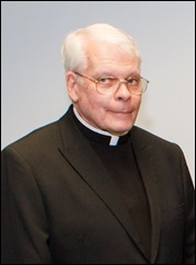 Pilot staff reporter Christopher S. Pineo receives his plaque of the Pontifical Mission Societies’ Archbishop Edward T. O’Meara Award from Cardinal Seán P. O'Malley Aug. 13, 2014. Pineo took first place in the category of Mission Animation News for his Aug. 30, 2013 story “Plymouth Religious Ed Students Use Lemonade Stand to Spread the Good News.” First presented in 1993, the award recognizes excellence in coverage of world mission news in the Catholic press. 
Pilot photo/ Gregory L. Tracy 
