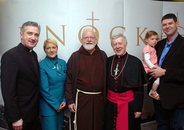 For Knock Shrine's Parish Priest Fr Richard Gibbons and his sister Aine, the arrival of Ireland West Airport's first transatlantic flight from Boston was a special day for the family. Senior Aer Lingus Cabin crew member Aine, pictured with her daughter Eva and husband Ronan O'Reilly, hosted the 179 pilgrims led by Archbishop of Boston Cardinal Sean O'Malley during their visit to the shrine and it's Basilica Rededication. included with the Cardinal and the Gibbons' family on their arrival is Archbishop of Tuam Dr. Michael Neary. Picture Henry Wills 