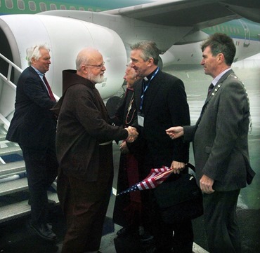 Archbishop of Boston Cardinal Sean O'Malley is welcomed to Ireland West Airport by Knock Shrine PP Fr Richard Gibbons and Mayo Co Council's Al McDonnell. Also alighting the flight is Airport's dedicated International Board Chairman New York's Brian O'Dwyer. Picture Henry Wills. 