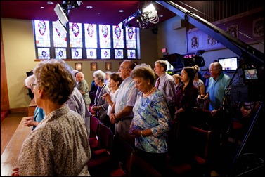 Bishops-elect Robert Reed and Mark O’Connell take their Oath of Fidelity before Cardinal O’Malley during a Mass broadcast live on CatholicTV Aug. 12, 2016. During the Mass, the cardinal also blessed the insignia — crossiers, mitres and rings — that the bishops will receive at their ordination.
Pilot photo/ Gregory L. Tracy 
