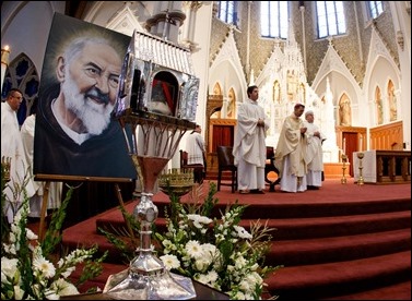 Bishop Robert P. Reed celebrates Mass for the Feast of St. Padre Pio at the Cathedral of the Holy Cross in the presence of the relic of the saint’s heart Sept. 23, 2016. Afterwards, the faithful were invited to venerate the relic. Pilot photo/ Gregory L. Tracy 