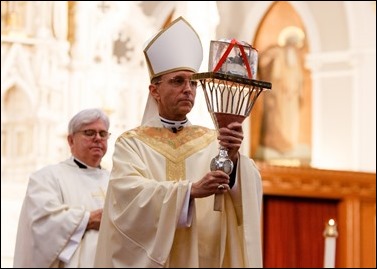 Bishop Robert P. Reed celebrates Mass for the Feast of St. Padre Pio at the Cathedral of the Holy Cross in the presence of the relic of the saint’s heart Sept. 23, 2016. Afterwards, the faithful were invited to venerate the relic. Pilot photo/ Gregory L. Tracy 