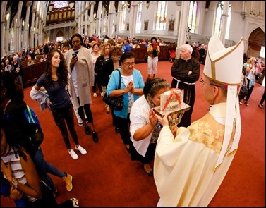 Bishop Robert P. Reed celebrates Mass for the Feast of St. Padre Pio at the Cathedral of the Holy Cross in the presence of the relic of the saint’s heart Sept. 23, 2016. Afterwards, the faithful were invited to venerate the relic. Pilot photo/ Gregory L. Tracy 