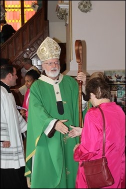 Cardinal O'Malley greeting parishioners