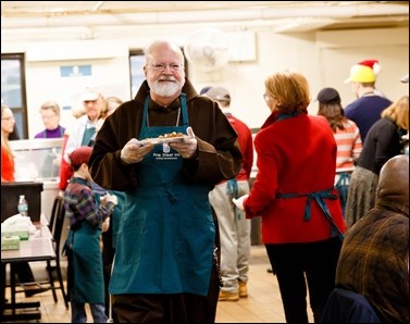 Cardinal Sean P. O’Malley joins volunteers serving Christmas Eve lunch at the Pine Street Inn shelter in Boston, Dec. 24, 2016.
Pilot photo/ Gregory L. Tracy
