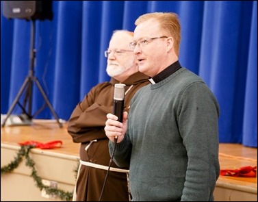 Cardinal O’Malley visits the Teen Center and St. Peter’s in Dorchester Saturday, Dec. 24, 2016. In partnership with the Menino family, Catholic Charities of Boston distributed Christmas gifts to nearly 400 children and families in need.
Pilot photo/ Gregory L. Tracy
