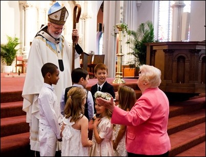 First Communions celebrated at the Cathedral of the Holy Cross, May 7, 2017. Pilot photo by Mark Labbe