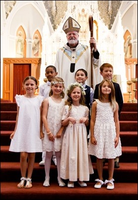 First Communions celebrated at the Cathedral of the Holy Cross, May 7, 2017. Pilot photo by Mark Labbe