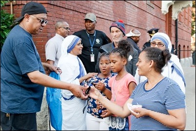 Cardinal O’Malley, priests and other religious leaders participate in a walk for peace in Dorchester, July 11, 2017. Pilot photo/ Mark Labbe 