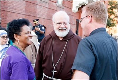 Cardinal O’Malley, priests and other religious leaders participate in a walk for peace in Dorchester, July 11, 2017. Pilot photo/ Mark Labbe 