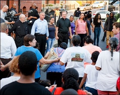 Cardinal O’Malley, priests and other religious leaders participate in a walk for peace in Dorchester, July 11, 2017. Pilot photo/ Mark Labbe 