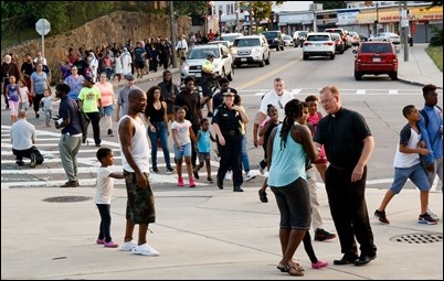 Cardinal O’Malley, priests and other religious leaders participate in a walk for peace in Dorchester, July 11, 2017. Pilot photo/ Mark Labbe 