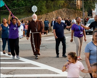 Cardinal O’Malley, priests and other religious leaders participate in a walk for peace in Dorchester, July 11, 2017. Pilot photo/ Mark Labbe 