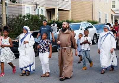 Cardinal O’Malley, priests and other religious leaders participate in a walk for peace in Dorchester, July 11, 2017. Pilot photo/ Mark Labbe 