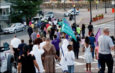 Cardinal O’Malley, priests and other religious leaders participate in a walk for peace in Dorchester, July 11, 2017. Pilot photo/ Mark Labbe 