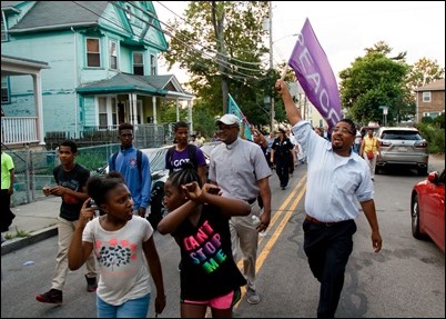 Cardinal O’Malley, priests and other religious leaders participate in a walk for peace in Dorchester, July 11, 2017. Pilot photo/ Mark Labbe 