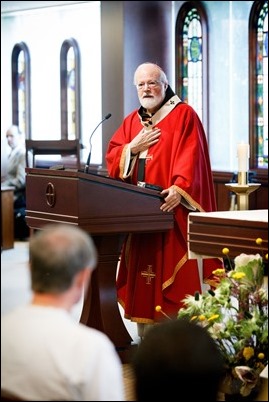 Prayer intentions of Catholic Appeal donors are placed before the altar during a special Mass celebrated by Cardinal Sean P. O'Malley at the Archdiocese of Boston’s Pastoral Center Aug. 24, 2017. Pilot photo/ Gregory L. Tracy 