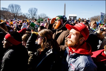 Crowds at the 2018 march for Life watch President Trump's live video address. Pilot Photo/ Gregory L. Tracy