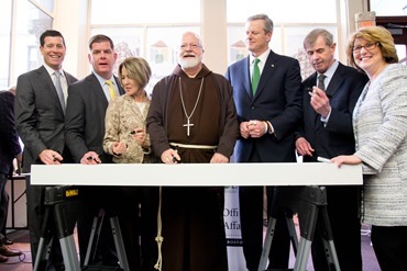 The Planning Office for Urban Affairs and St. Francis House brakes ground Jan. 16, 2018 on The Union, an affordable housing redevelopment located at 48 Boylston St. in downtown Boston. Cardinal Sean P. O’Malley, Gov. Charlie Baker, Mayor Martin J. Walsh, Planning Office for Urban Affairs President Lisa Alberghini, and President and CEO of St. Francis House Karen LaFrazia, were joined by leaders from business, government and the private sector at the ground breaking. Participants signed a beam that will be used the construction of the new facility.<br /> Pilot photo/ Mark Labbe 