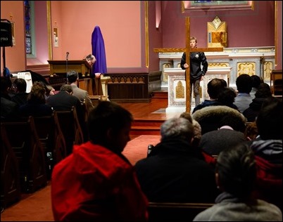 Cardinal O’Malley greets members of Communion and Liberation who concluded their Good Friday Stations of the Cross at the Cathedral, March 30, 2018. Pilot photo/ Mark Labbe 