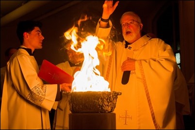 Cardinal O’Malley celebrates the Easter Vigil with the blessing of the Easter fire and the reception of new members of the Church at the Cathedral of the Holy Cross, March 31, 2018. Pilot photo/ Mark Labbe 