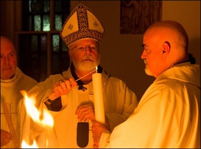 Cardinal O’Malley celebrates the Easter Vigil with the blessing of the Easter fire and the reception of new members of the Church at the Cathedral of the Holy Cross, March 31, 2018. Pilot photo/ Mark Labbe 