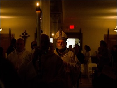 Cardinal O’Malley celebrates the Easter Vigil with the blessing of the Easter fire and the reception of new members of the Church at the Cathedral of the Holy Cross, March 31, 2018. Pilot photo/ Mark Labbe 