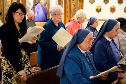 Good Friday Liturgy of the Lord’s Passion with veneration of the cross at the Cathedral of the Holy Cross, March 30, 2018. Pilot photo/ Mark Labbe