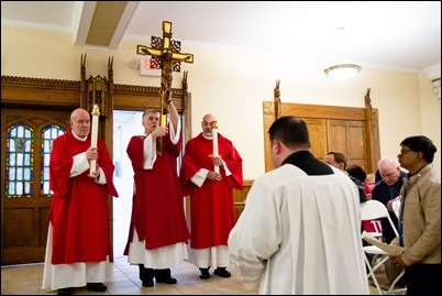 Good Friday Liturgy of the Lord’s Passion with veneration of the cross at the Cathedral of the Holy Cross, March 30, 2018. Pilot photo/ Mark Labbe