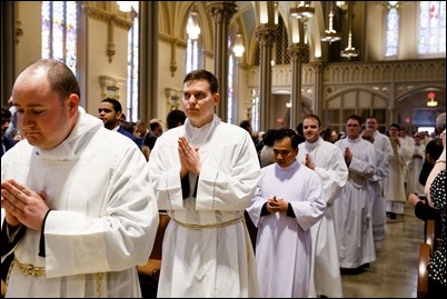 Ordination of Transitional Deacons Joseph Almeida, Maciej Kazimierz Araszkiewicz, Corey Bassett-Tirrell, Marcos Enrique, Timothy Paul Hynes, Przemyslaw Kasprzak, Brother John Edward Koelle OFM Cap., Brian Peter O’Hanlon, Mark Teodor Olejnik, Francis Huy Duc Pham, William Henry Robinson, Carignan Langlois Rouse, Victor Luna Vitug II, and James Paul Wargovich at Immaculate Conception Church in Lowell, April 14, 2018. Pilot photo/ Gregory L. Tracy 