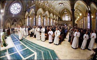 Ordination of Transitional Deacons Joseph Almeida, Maciej Kazimierz Araszkiewicz, Corey Bassett-Tirrell, Marcos Enrique, Timothy Paul Hynes, Przemyslaw Kasprzak, Brother John Edward Koelle OFM Cap., Brian Peter O’Hanlon, Mark Teodor Olejnik, Francis Huy Duc Pham, William Henry Robinson, Carignan Langlois Rouse, Victor Luna Vitug II, and James Paul Wargovich at Immaculate Conception Church in Lowell, April 14, 2018. Pilot photo/ Gregory L. Tracy 