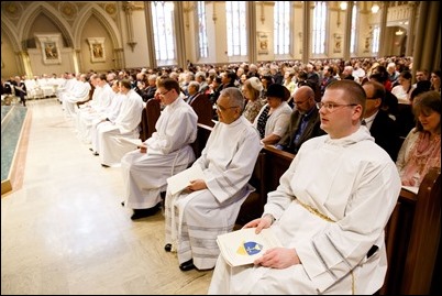 Ordination of Transitional Deacons Joseph Almeida, Maciej Kazimierz Araszkiewicz, Corey Bassett-Tirrell, Marcos Enrique, Timothy Paul Hynes, Przemyslaw Kasprzak, Brother John Edward Koelle OFM Cap., Brian Peter O’Hanlon, Mark Teodor Olejnik, Francis Huy Duc Pham, William Henry Robinson, Carignan Langlois Rouse, Victor Luna Vitug II, and James Paul Wargovich at Immaculate Conception Church in Lowell, April 14, 2018. Pilot photo/ Gregory L. Tracy 