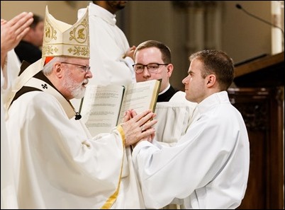 Ordination of Transitional Deacons Joseph Almeida, Maciej Kazimierz Araszkiewicz, Corey Bassett-Tirrell, Marcos Enrique, Timothy Paul Hynes, Przemyslaw Kasprzak, Brother John Edward Koelle OFM Cap., Brian Peter O’Hanlon, Mark Teodor Olejnik, Francis Huy Duc Pham, William Henry Robinson, Carignan Langlois Rouse, Victor Luna Vitug II, and James Paul Wargovich at Immaculate Conception Church in Lowell, April 14, 2018. Pilot photo/ Gregory L. Tracy 