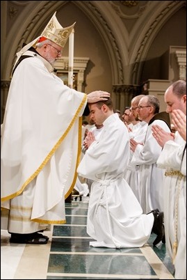 Ordination of Transitional Deacons Joseph Almeida, Maciej Kazimierz Araszkiewicz, Corey Bassett-Tirrell, Marcos Enrique, Timothy Paul Hynes, Przemyslaw Kasprzak, Brother John Edward Koelle OFM Cap., Brian Peter O’Hanlon, Mark Teodor Olejnik, Francis Huy Duc Pham, William Henry Robinson, Carignan Langlois Rouse, Victor Luna Vitug II, and James Paul Wargovich at Immaculate Conception Church in Lowell, April 14, 2018. Pilot photo/ Gregory L. Tracy 