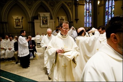 Ordination of Transitional Deacons Joseph Almeida, Maciej Kazimierz Araszkiewicz, Corey Bassett-Tirrell, Marcos Enrique, Timothy Paul Hynes, Przemyslaw Kasprzak, Brother John Edward Koelle OFM Cap., Brian Peter O’Hanlon, Mark Teodor Olejnik, Francis Huy Duc Pham, William Henry Robinson, Carignan Langlois Rouse, Victor Luna Vitug II, and James Paul Wargovich at Immaculate Conception Church in Lowell, April 14, 2018. Pilot photo/ Gregory L. Tracy 