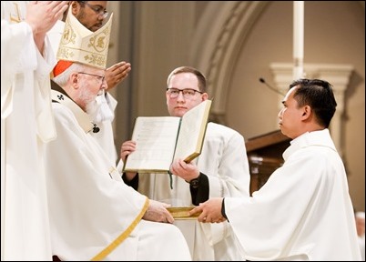 Ordination of Transitional Deacons Joseph Almeida, Maciej Kazimierz Araszkiewicz, Corey Bassett-Tirrell, Marcos Enrique, Timothy Paul Hynes, Przemyslaw Kasprzak, Brother John Edward Koelle OFM Cap., Brian Peter O’Hanlon, Mark Teodor Olejnik, Francis Huy Duc Pham, William Henry Robinson, Carignan Langlois Rouse, Victor Luna Vitug II, and James Paul Wargovich at Immaculate Conception Church in Lowell, April 14, 2018. Pilot photo/ Gregory L. Tracy 