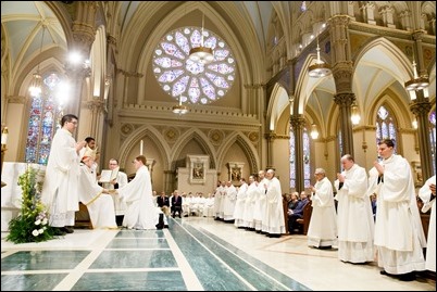 Ordination of Transitional Deacons Joseph Almeida, Maciej Kazimierz Araszkiewicz, Corey Bassett-Tirrell, Marcos Enrique, Timothy Paul Hynes, Przemyslaw Kasprzak, Brother John Edward Koelle OFM Cap., Brian Peter O’Hanlon, Mark Teodor Olejnik, Francis Huy Duc Pham, William Henry Robinson, Carignan Langlois Rouse, Victor Luna Vitug II, and James Paul Wargovich at Immaculate Conception Church in Lowell, April 14, 2018. Pilot photo/ Gregory L. Tracy 