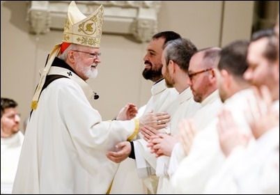 Ordination of Transitional Deacons Joseph Almeida, Maciej Kazimierz Araszkiewicz, Corey Bassett-Tirrell, Marcos Enrique, Timothy Paul Hynes, Przemyslaw Kasprzak, Brother John Edward Koelle OFM Cap., Brian Peter O’Hanlon, Mark Teodor Olejnik, Francis Huy Duc Pham, William Henry Robinson, Carignan Langlois Rouse, Victor Luna Vitug II, and James Paul Wargovich at Immaculate Conception Church in Lowell, April 14, 2018. Pilot photo/ Gregory L. Tracy 